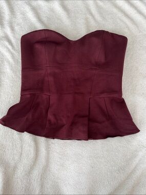 Babaton Strapless Peplum Top in Wine